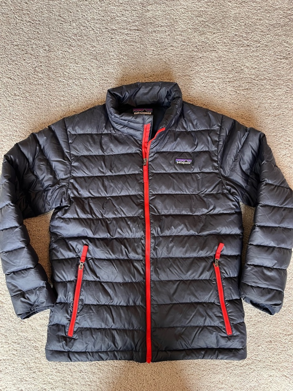 Patagonia Kids size L/12 Navy Blue Down Jacket with Red Zippers
